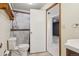 Tiled shower and toilet in a bright and neat bathroom at 215 Sunland St, Louisville, CO 80027