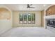 Spacious living room with a fireplace and large windows offering ample natural light at 215 Sunland St, Louisville, CO 80027