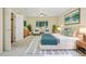 Well lit bedroom featuring furniture, a large bed, natural light and carpeted floors at 215 Sunland St, Louisville, CO 80027