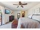 Bright bedroom offers access to a private deck and walk-in closet at 31911 Warrens Rd, Golden, CO 80403