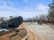 Gated community entrance with a buffalo statue, providing security and character at 1222 Buffalo Ridge Rd, Castle Pines, CO 80108