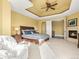 Main bedroom includes a fireplace, sitting area, and ensuite bathroom at 1222 Buffalo Ridge Rd, Castle Pines, CO 80108