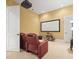 Cozy home theater room with recliner seating and a projector screen at 1222 Buffalo Ridge Rd, Castle Pines, CO 80108