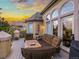 Relaxing deck with comfortable seating and views of the surrounding landscape at 1222 Buffalo Ridge Rd, Castle Pines, CO 80108