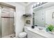 Modern bathroom featuring a tiled shower, vanity, and stylish fixtures at 1758 Sinton Rd, Evergreen, CO 80439