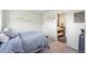 Cozy bedroom with a glimpse into a stylish en-suite bathroom at 1758 Sinton Rd, Evergreen, CO 80439