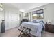 Cozy bedroom with natural light, neutral tones and ample closet space at 1758 Sinton Rd, Evergreen, CO 80439
