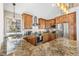 Beautiful kitchen featuring granite countertops, stainless steel appliances, and wood cabinets at 1758 Sinton Rd, Evergreen, CO 80439