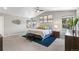 Serene bedroom with vaulted ceilings, nature-inspired decor, and plush carpeting at 1758 Sinton Rd, Evergreen, CO 80439