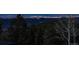 Night view overlooking a cityscape from an elevated vantage point in a mountainous environment at 1758 Sinton Rd, Evergreen, CO 80439