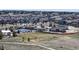 An aerial shot of a neighborhood showing a community pool, clubhouse, and surrounding homes at 8605 S Zante Ct, Aurora, CO 80016