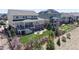 Beautiful backyard with a manicured lawn, a patio, and lush landscaping at 8605 S Zante Ct, Aurora, CO 80016