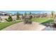 Inviting backyard features a brick patio and manicured lawn, perfect for outdoor entertaining and enjoying the serene neighborhood at 8605 S Zante Ct, Aurora, CO 80016