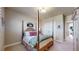 Charming bedroom with four-poster bed, a comfortable design, and relaxing atmosphere at 8605 S Zante Ct, Aurora, CO 80016