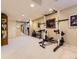 Spacious basement featuring a home gym with workout equipment and neutral colored walls at 9625 S Hackberry St, Highlands Ranch, CO 80129
