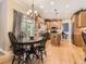 Well-designed kitchen with hardwood floors, granite countertops, and ample cabinet space at 9625 S Hackberry St, Highlands Ranch, CO 80129