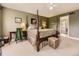 Spacious main bedroom with ceiling fan, carpet, a king bed and an ensuite bathroom at 9625 S Hackberry St, Highlands Ranch, CO 80129
