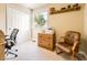 Cozy office space with window, filing cabinet and a comfortable place to work at 9625 S Hackberry St, Highlands Ranch, CO 80129