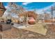 Backyard featuring a patio with outdoor seating, ideal for relaxing and entertaining in a private setting at 2496 S Leyden St, Denver, CO 80222