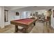 Finished basement with custom pool table and lighting at 2496 S Leyden St, Denver, CO 80222