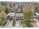 Aerial view of the home, showcasing its curb appeal and location among mature trees at 455 Forest St, Denver, CO 80220