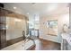 Elegant bathroom with a glass-enclosed shower, modern fixtures, and a relaxing ambiance at 455 Forest St, Denver, CO 80220