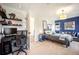 Multi-purpose bedroom features a bed, seating area, and desk for home office and homework space at 455 Forest St, Denver, CO 80220