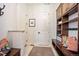 Mudroom with built-in storage, bench, and convenient access to the home's interior at 455 Forest St, Denver, CO 80220