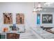 Basement wet bar featuring stone countertops, a wine rack, and modern fixtures at 455 Forest St, Denver, CO 80220