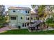 This home has a large deck overlooking a well maintained backyard, perfect for outdoor gatherings at 6266 Holman St, Arvada, CO 80004