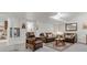Cozy living room features plush leather seating, a decorative rug, and warm, inviting lighting at 6266 Holman St, Arvada, CO 80004