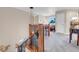 Staircase leads to the upper level of the home at 6266 Holman St, Arvada, CO 80004