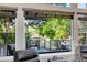 Large windows look out to a sprawling deck with picturesque water views at 6266 Holman St, Arvada, CO 80004