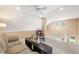 Spacious bonus room with good natural light, with view to the staircase at 8403 S Miller Ct, Littleton, CO 80127