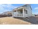 Backyard featuring a covered porch, perfect for outdoor enjoyment and entertaining at 14800 Hudson St, Thornton, CO 80602
