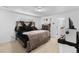 Modern bedroom with plush bed, dresser, and carpeted floors for maximum comfort at 14800 Hudson St, Thornton, CO 80602