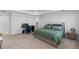 Large bedroom featuring a bed, office area, and access to bathroom at 14800 Hudson St, Thornton, CO 80602