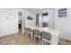 Charming dining area with ample seating and natural light, ideal for Gathering gatherings and entertaining at 14800 Hudson St, Thornton, CO 80602