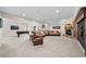 Finished basement with a pool table, fireplace, sectional sofa, and neutral colored walls at 3315 Klondike Pl, Castle Rock, CO 80108