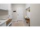 Functional mudroom with built-in bench, storage cabinets, and convenient access to the entryway at 3315 Klondike Pl, Castle Rock, CO 80108