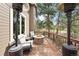 Outdoor deck with heaters and comfortable seating around a stone fire pit at 3315 Klondike Pl, Castle Rock, CO 80108