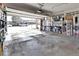 Spacious garage with ample storage and an open overhead door at 13957 E Louisiana Pl, Aurora, CO 80012