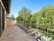 Private balcony overlooking a lush, green backyard at 21 S Kearney St, Denver, CO 80224