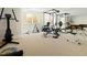 Home gym with various workout equipment and mirrored walls at 21 S Kearney St, Denver, CO 80224