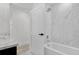 Modern bathroom with tub and shower featuring marble accents and contemporary fixtures at 1308 Snowberry Ln # 301, Louisville, CO 80027