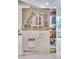 Marketing brochure showcasing community details with site plans, maps, and lifestyle images for a modern development at 1308 Snowberry Ln # 301, Louisville, CO 80027