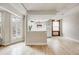 Bright open living space with hardwood floors and a view into the kitchen at 215 E 11Th Ave # C3, Denver, CO 80203