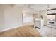 Bright open living space with hardwood floors and a view into the kitchen at 215 E 11Th Ave # C3, Denver, CO 80203