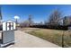 Backyard featuring spacious yard with shed, fence, and basketball hoop at 10454 Grant Dr, Northglenn, CO 80233