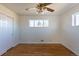 Bedroom with hardwood floors, a window, and a closet at 10454 Grant Dr, Northglenn, CO 80233